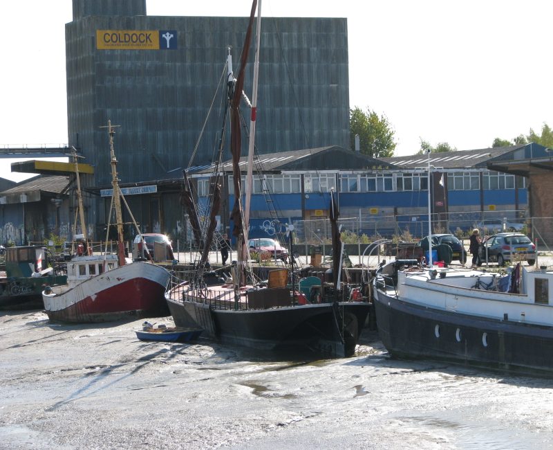 River boats at low tide near Colchester in the River Colne