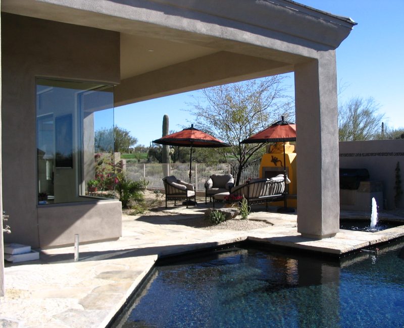 The steps of the pool extended under the roof